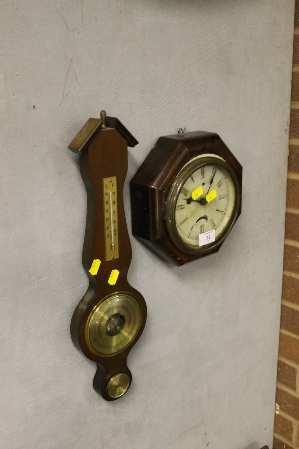 A SMALL OAK FRAMED CLOCK & A BAROMETER