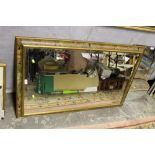 A LARGE DECORATIVE MIRROR