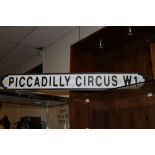 A WOODEN 'PICADILLY CIRCUS' SIGN