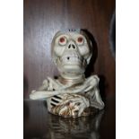 *A CAST SKELETON MONEY BANK