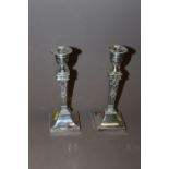 A PAIR OF EDWARDIAN STYLE CANDLESTICKS WITH HALLMARKED SILVER SCONCES