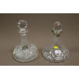 A HALLMARKED SILVER RIMMED CUT GLASS SHIPS DECANTER + ANOTHER