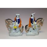 A PAIR OF STAFFORDSHIRE STYLE HORSEMEN