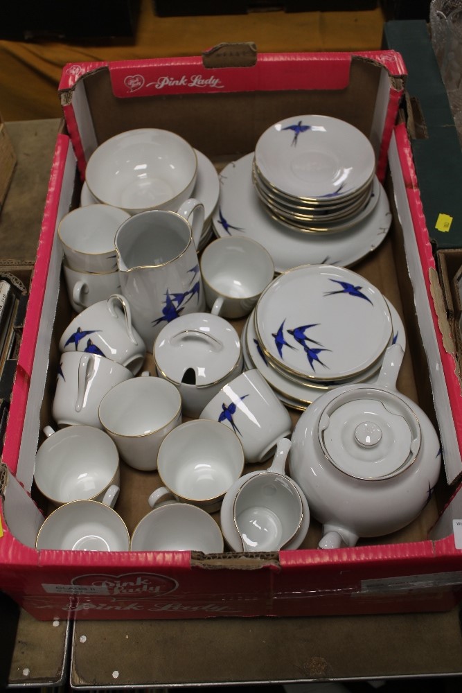 A TRAY OF CZECHOSLOVAKIAN TEA AND DINNER WARE WITH SWALLOW DECORATION