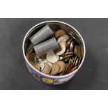 A TIN OF COINS MAINLY BRITISH EDWARDIAN AND LATER TO INCLUDE THREE SILVER HALF CROWNS ETC