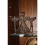 A CUT GLASS DECANTER TOGETHER WITH THREE GLASSES