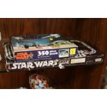 A BOXED STAR WARS BOARD GAME, TOGETHER WITH A STAR WARS JIGSAW