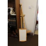 AN ARTISTS EASEL TOGETHER WITH TWO WOODEN TRAYS