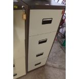 A METAL FOUR DRAW FILING CABINET