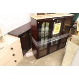 A LARGE THREE DOOR DISPLAY CABINET + A TWO DOOR DISPLAY CABINET