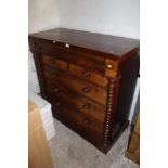 AN ANTIQUE MAHOGANY SCOTTISH CHEST OF DRAWERS WITH BARLEY TWIST COLUMNS