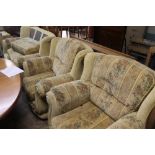 AN UPHOLSTERED THREE PIECE SUITE