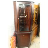 A STAG MINSTREL FLOORSTANDING CORNER CABINET