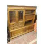 A LARGE OAK GLAZED/LEADED BOOKCASE