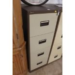 A METAL FOUR DRAW FILING CABINET