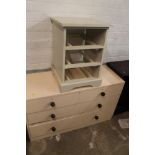 A CREAM PAINTED CHEST OF DRAWERS TOGETHER WITH A WHITE UNIT