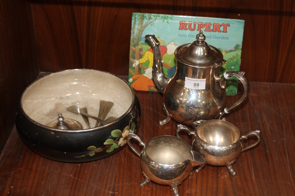 A SELECTION OF METALWARE, TOGETHER WITH A RUPERT POP-UP BOOK