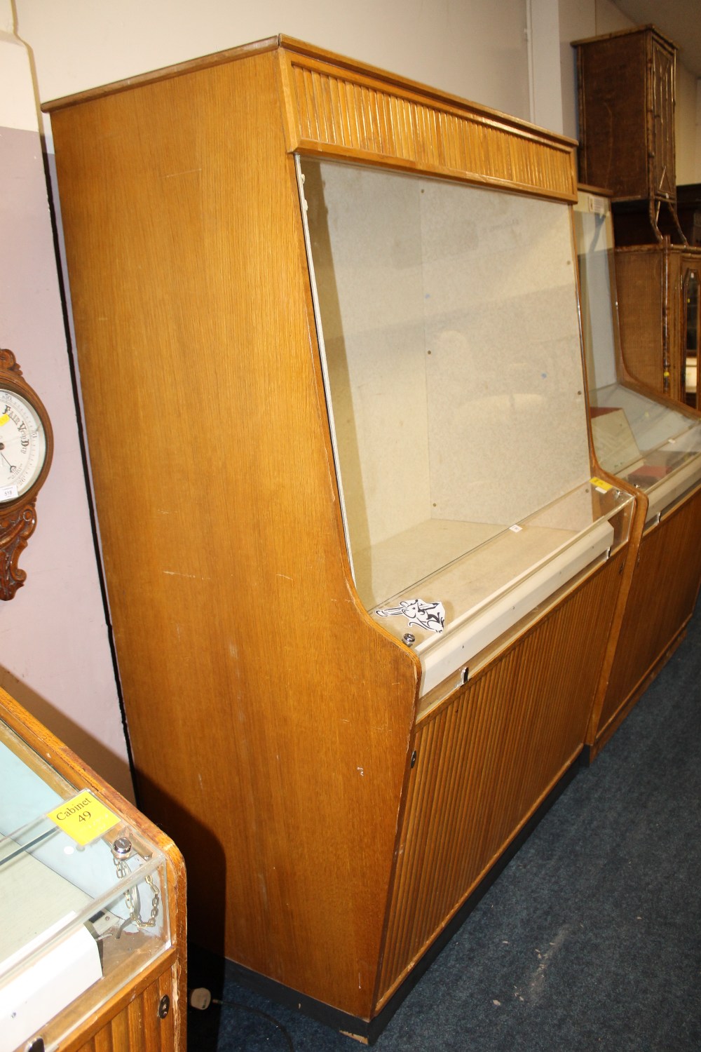 A TALL GLAZED DISPLAY CABINET - FROM BIRMINGHAM PEN MUSEUM