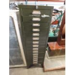 A GALVANISED STEEL CHEST OF DRAWERS
