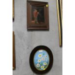 AN OVAL PAINTING ON PORCELAIN OF FLOWERS, TOGETHER WITH AN OIL ON CANVAS DEPICTING A MAN LIGHTING