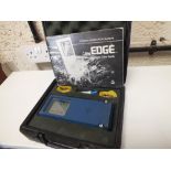 THE EDGE ELECTRONIC DIVE GUIDE IN A CASE PLUS A PORTABLE TYPEWRITER