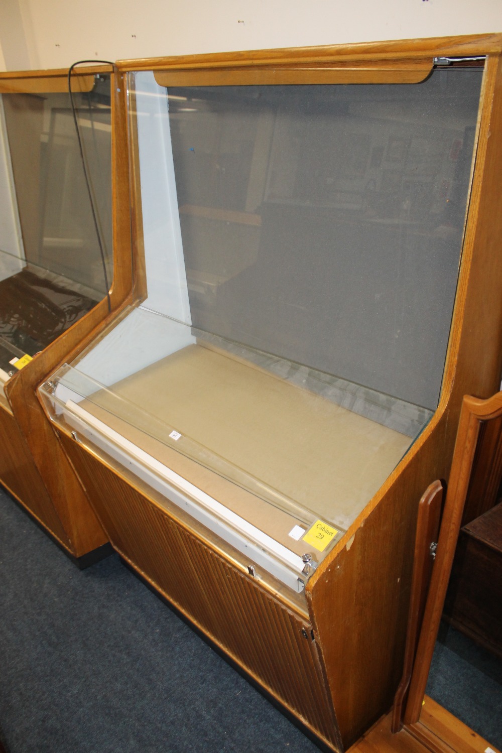 A TALL GLAZED DISPLAY CABINET - FROM BIRMINGHAM PEN MUSEUM