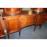 A LARGE BOW FRONTED MAHOGANY SIDEBOARD RAISED ON EIGHT LEGS WITH CARVED DETAILS