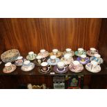 EIGHTEEN LIMITED EDITION COALPORT CUP & SAUCERS OF VARIOUS PATTERNS WITH FIVE COLLECTORS PLATES