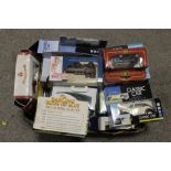 A COLLECTION OF BOXED TOY CARS ETC