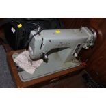 A VINTAGE ZEPHYR SEWING MACHINE