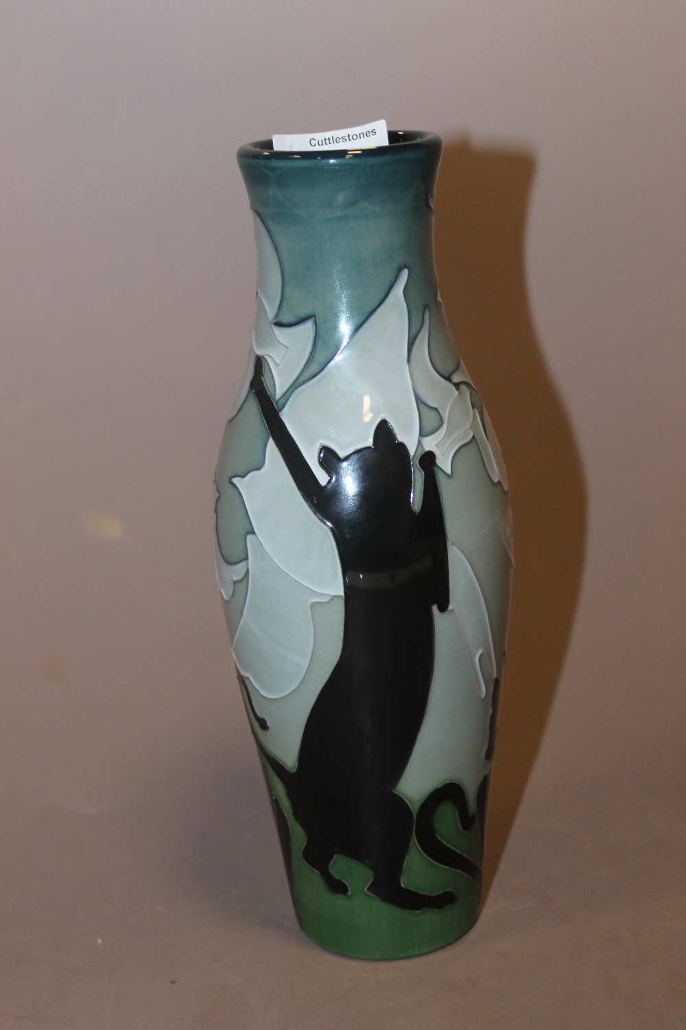 A MOORCROFT BLACK CAT VASE