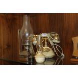 A SLOANE TELEPHONE & THREE OIL LAMPS