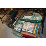 FOUR TRAYS OF ASSORTED BOOKS