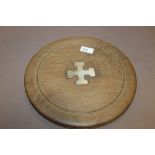 A WINCHESTER CHOPPING BOARD WITH MOUNTED HALLMARKED SILVER CROSS