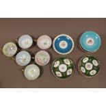 A COLLECTION OF SUSIE COOPER CUPS & SAUCERS