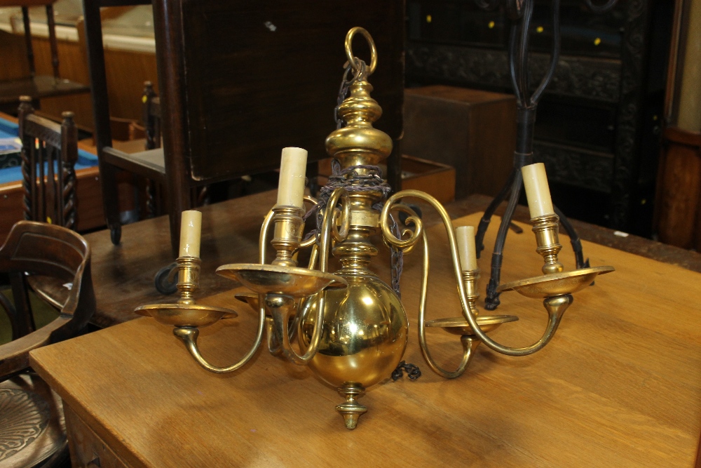 A LARGE BRASS FIVE BRANCH CHANDELIER