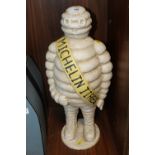 A LARGE CAST MICHELIN MAN FIGURE