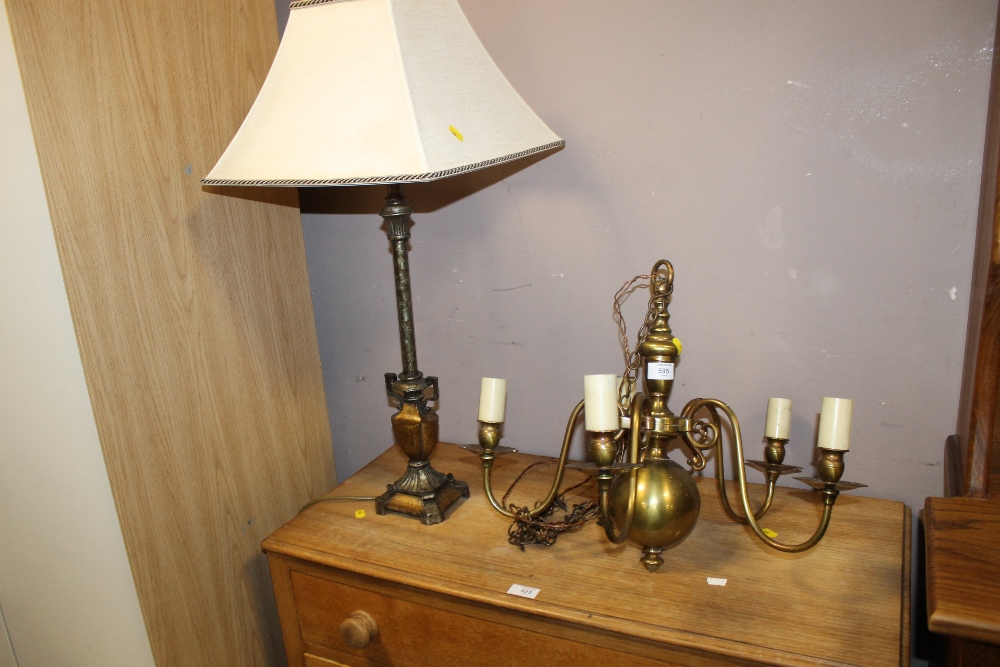 A PAIR OF BRASS FIVE BRANCH CHANDELIERS + A TABLE LAMP (3)