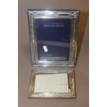 TWO HALLMARKED SILVER PICTURE FRAMES