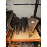 A LARGE WORKTOP VICE TOGETHER WITH DIFFERENT SIZED HOISTS