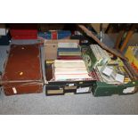 TWO TRAYS OF BOOKS & ANNUALS TOGETHER WITH A VINTAGE SUITCASE OF EPHEMERA, MAPS, SLIDE RULES ETC