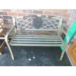 A PAINTED FLORAL DESIGN METAL GARDEN BENCH