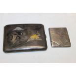 A CIGARETTE CASE FEATURING MOUNT FUJI & A WHITE METAL FLIP CASE