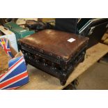 A VINTAGE LEATHER UPHOLSTERED FOOT STOOL