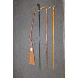 THREE WALKING CANES TO INC A SILVER COLLARED EXAMPLE & A TOY GUNª