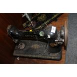 A VINTAGE SINGER SEWING MACHINE