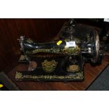 A VINTAGE STANDARD SEWING MACHINE