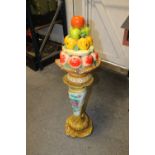 A FLORAL JARDINIERE STAND & FRUIT ORNAMENT