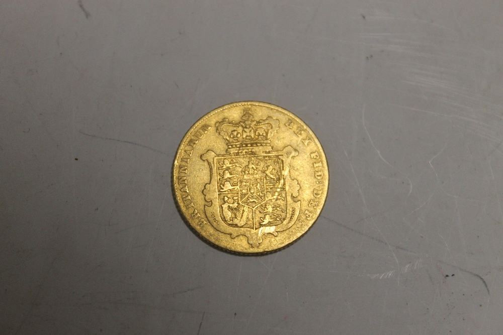 A GEORGE IV BARE HEAD SHIELD BACK SOVEREIGN DATED 1826