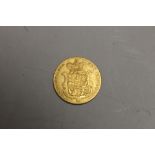 A GEORGE IV BARE HEAD SHIELD BACK SOVEREIGN DATED 1826